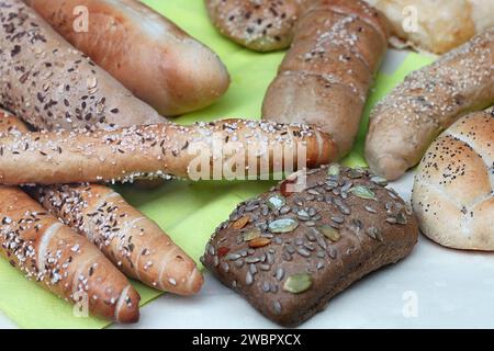 A display of various types of bread in a bakery. Stock Photo