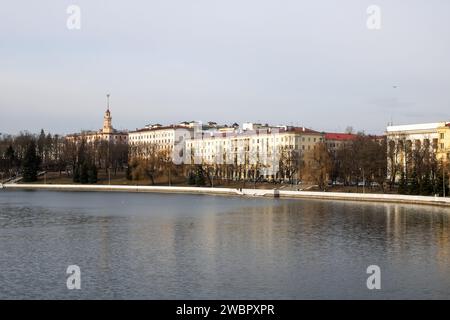 Belarus, Minsk - 24 march, 2023: Houses on the banks of the river autumn Stock Photo
