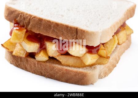 Traditional British chip butty (french fry sandwich) isolated on white background Stock Photo
