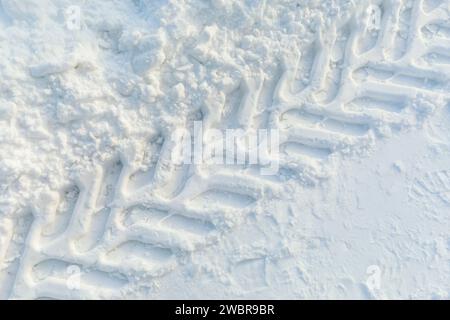 Tractor tracks on the snow, top view Stock Photo
