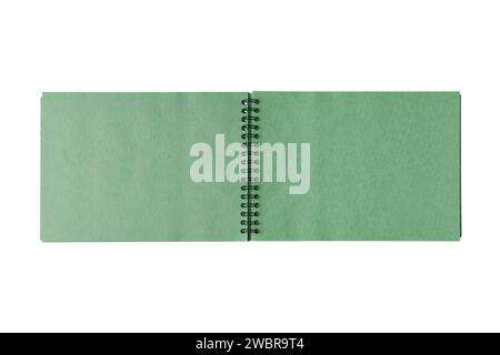 Open spiral bound notepad with two craft green sheets, isolated on white background. Top view, copy space for text, template, mockup Stock Photo