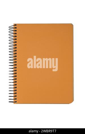 Closed spiral bound notepad with orange cover isolated on white background. Top view, copy space for text, template, mockup. Stock Photo