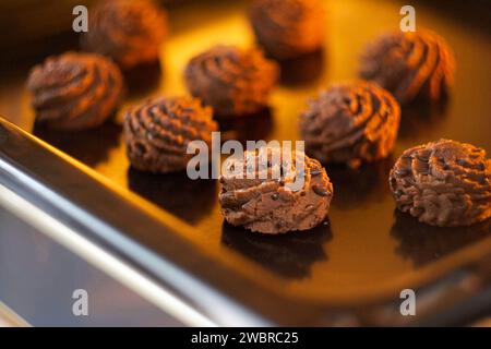 Chocolate brownie is on a baking sheet Stock Photo