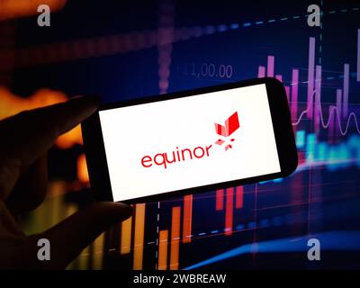 Konskie, Poland - January 04, 2024: Equinor company logo displayed on mobile phone screen Stock Photo