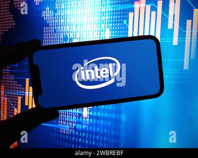 Konskie, Poland - January 04, 2024: Intel company logo displayed on mobile phone screen Stock Photo