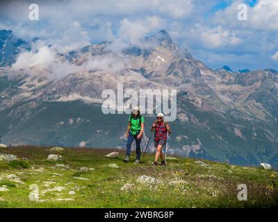 Switserland, two Duych women hiking in the swiss Alps near the Italian border. Stock Photo