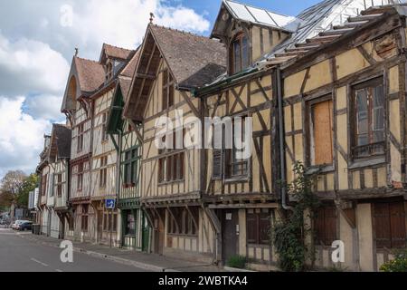 Medieval timber-framed houses, some restored, others not at the eastern, less touristy, end of the rue Kléber in Troyes' historic city centre, France. Stock Photo