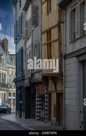 Medieval half-timbered buildings, some restored, some less so, on the rue Turenne in the historic city centre of Troyes, France. Stock Photo