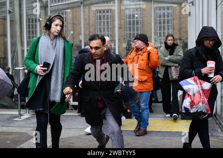 25th January, 2023: Commuters arrive for work on a foggy winter’s day in the City of London. Stock Photo