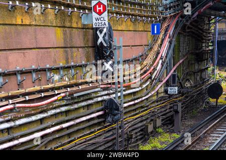 Wiring running along wall for technical wallpaper backgrop Stock Photo