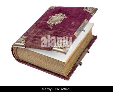open ancient magic spell book with metallic ornaments bound in cloth isolated on white background Stock Photo