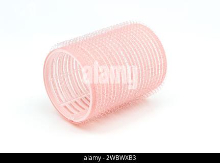 Single plastic hair curler isolated on white background Stock Photo