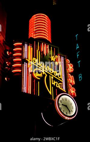 Art Deco inspired neon sign at night at Hollywood and Vine in Hollywood, CA, USA Stock Photo