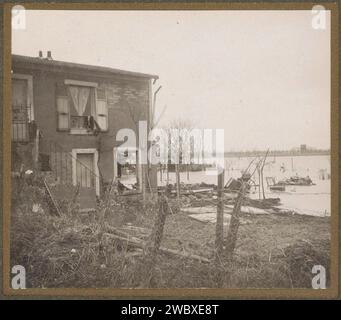 Destroyed house in a flooded suburb of Paris, G. Dangereux, 1910 photograph Part of photo album flooding Paris and suburbs 1910. Paris photographic support  flood (+ landscape with figures, staffage) Paris Stock Photo