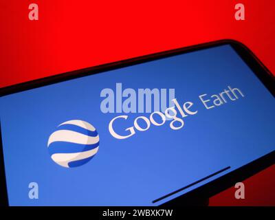 Konskie, Poland - January 12, 2024: Google Earth logo displayed on mobile phone screen Stock Photo