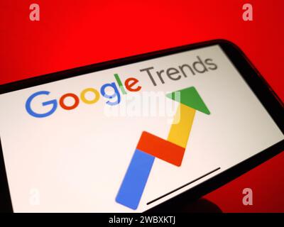 Konskie, Poland - January 12, 2024: Google Trends logo displayed on mobile phone screen Stock Photo