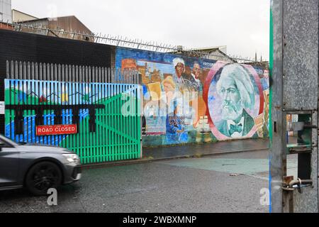 The separation gates between the Catholic nationalist area and the Protestant unionist are in Belfast, put up during the sectarian & violent Troubles. Stock Photo