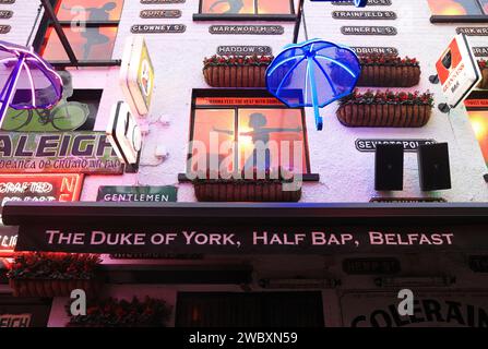 The Duke of York, a traditional, popular Belfast pub, with craic, music & humour, on a narrow, cobbled alleyway in the historic Half Bap area, in NI. Stock Photo
