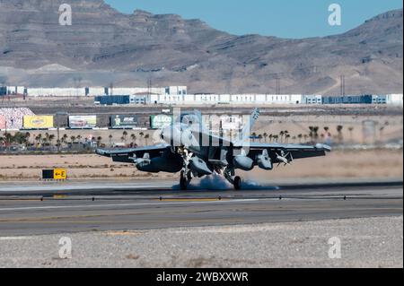 A U.S. Navy EA-18G Growler assigned to Naval Air Station Whidbey Island, Washington, arrives for Red Flag-Nellis 24-1 at Nellis Air Force Base, Nevada, Jan. 10, 2024. Participants conduct a variety of scenarios, including defensive counter air, offensive counter air suppression of enemy air defenses and offensive counter air-air interdiction. (U.S. Air Force photo by William R. Lewis) Stock Photo