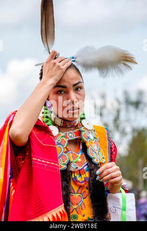 Canada First Nations Oneida/Ojibwa young woman participating in a Pow Wow competition in London, Ontario, Canada. Stock Photo