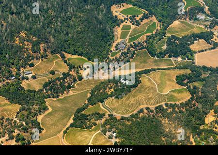 Aerial view of terraced rows of plants in farm fields, vineyards, and the agricultural towns of norther California Stock Photo