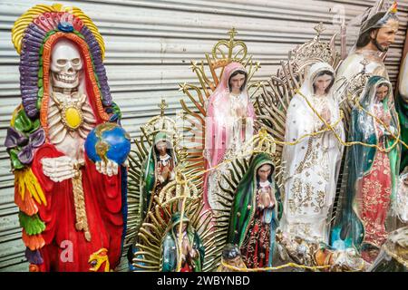 Merida Mexico,centro historico central historic district,religious statues statuettes,Our Lady of Guadalupe Virgin,Day of Dead skeleton,Dia de los Mue Stock Photo
