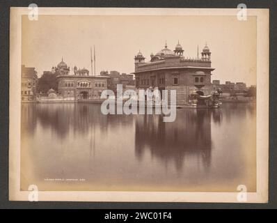 Golden Temple or Harmandir Sahib in Amritsar, Punjab, India, Samuel Bourne (attributed to), 1864 photograph The Golden Temple in Amritsar, located in the Northern Indian state of Punjab, is the most important sanctuary of Sikhism. The Sikh call the Sri Harmandir Sahib Gurudwara temple. The temple is located in Sarovarme. Punjab was the starting point for the expedition from Bourne to Kasmir in 1864. Amritsar cardboard. paper albumen print temple, shrine  Hinduism, Buddhism, Jainism. exterior  representation of a building Harmandir Sahib Stock Photo