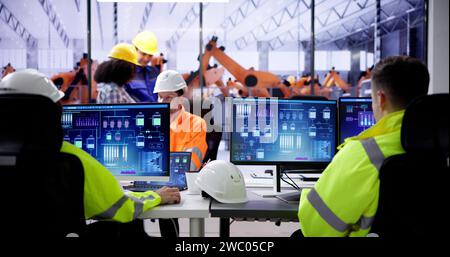 Engineer Operators Using Scada System At Industrial Plant Stock Photo