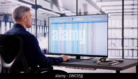 Spreadsheet Analyst Employee Or Professional Medical Coder Stock Photo