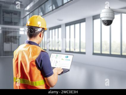 Engineer work with security camera or cctv camera in factory Stock Photo