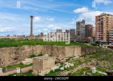 Giant ancient Pompey's pillar on territory of Serapeum of Alexandria in Egypt Stock Photo