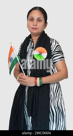 Portrait view of a young Indian woman with a national flag with a tricolor badge Stock Photo