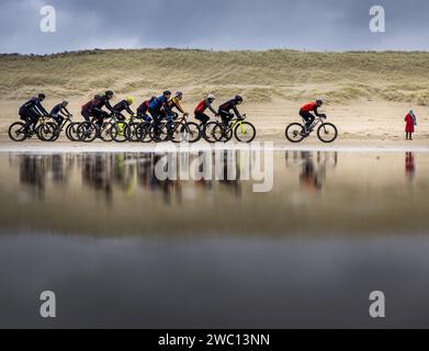 EGMOND AAN ZEE - Participants in action on the beach during the GP Groot Egmond-Pier-Egmond beach race. ANP KOEN VAN WEEL Stock Photo