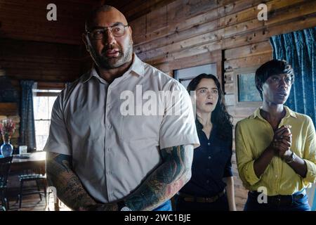 Knock at the Cabin (2023) directed by M. Night Shyamalan and starring Dave Bautista, Nikki Amuka-Bird and Abby Quinn. While vacationing, a girl and her parents are taken hostage by armed strangers who demand that the family make a choice to avert the apocalypse. Publicity photograph ***EDITORIAL USE ONLY***. Credit: BFA / PhoByMo / Universal Pictures Stock Photo