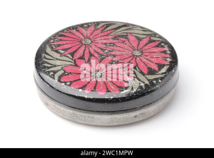 Old scratyched round tin box isolated on white Stock Photo