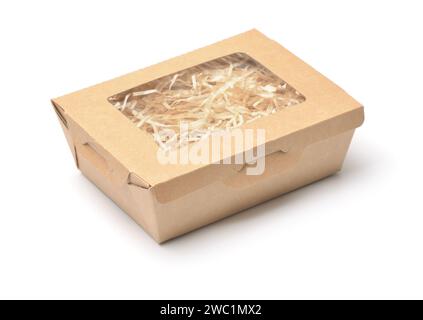 Paper box with transparent window full of shredded  paper filler isolated on white Stock Photo