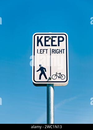 Bicycle and pedestrian shared route sign on clear sky background Stock Photo