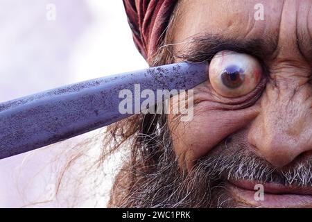 India. 12th Jan, 2024. Indian Muslim Sufi devotee use sharp objects to self-flagellate in a procession during the Urs festival at the shrine of Sufi saint Khwaja Moinuddin Chishti in Ajmer, Rajasthan, India, on 12 January 2024. Thousands of Sufi devotees from different parts of India travel to the shrine for the annual festival, marking the death anniversary of the saint. Photo by ABACAPRESS.COM Credit: Abaca Press/Alamy Live News Stock Photo