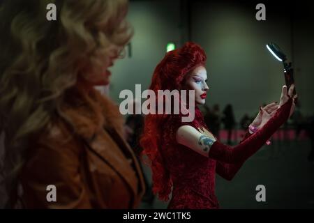 London, UK. 13th January 2024. Vibrant Drag Queens and fans arrive at ExCel London venue for the official opening of DragCon UK, one of the biggest celebrations of Drag, running from 12-14 January. Credit: Guy Corbishley/Alamy Live News Stock Photo