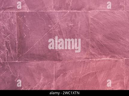 The surface of the stone slabs. Abstract background for design with fuchsia color copy space. Stock Photo