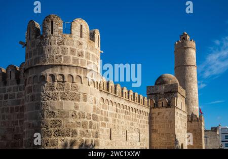 The imposing walls, ramparts and tower of the 8th century religious fortress, the Ribat of Sousse in Tunisia. It is a UNESCO World Heritage Site. Stock Photo