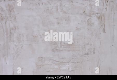 Abstract background from a wall covered with gray plaster. Stock Photo