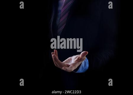 Businessman in a suit with open hands. Change, Digitization, People, Digital Transformation, Concepts Stock Photo