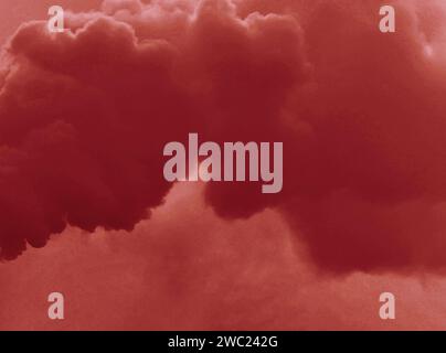 Abstract background of red smoke infecting the environment. Plant emits smoke smog chimneys in cloudy fog. Stock Photo