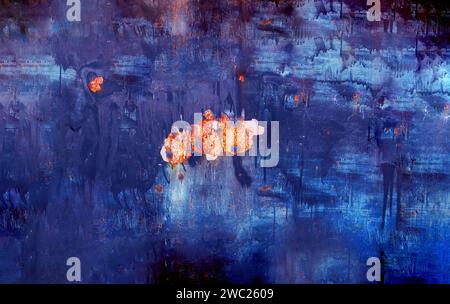 Abstract background of old paint damaged by time and covered with rust spots. Texture of blue worn paint on metal. Stock Photo