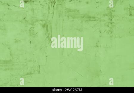 Green color plastered surface. Decorative embossed concrete and glue plaster. Stock Photo