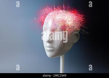 Fireworks in a neutral mannequin head, concept for ideas, inspiration and creative connections but also for neurology, headache, migraine or mental pr Stock Photo