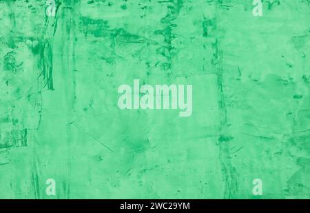 Cement wall painted with green paint. Stock Photo