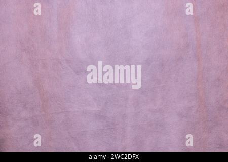 The texture is pale red in non-woven fabric. Background for design with copy space..... Stock Photo