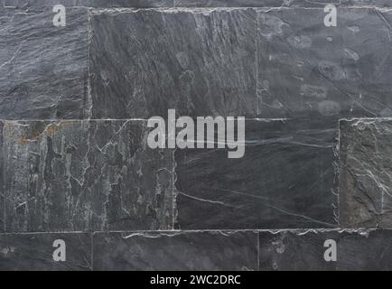 Marble texture background, stone, granite, floor, tile, black. Stone wall close-up. The surface of the stone slabs. Background for design with copy sp Stock Photo